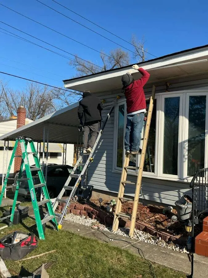 Restoration crew performing exterior repair in Germantown